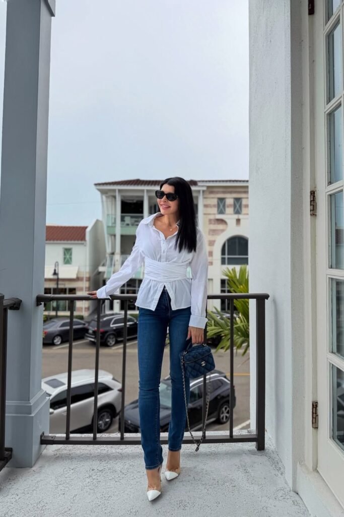 White Wrap-Waist Button-Down + Dark Wash Skinny Jeans + White and Clear Pointed Heels