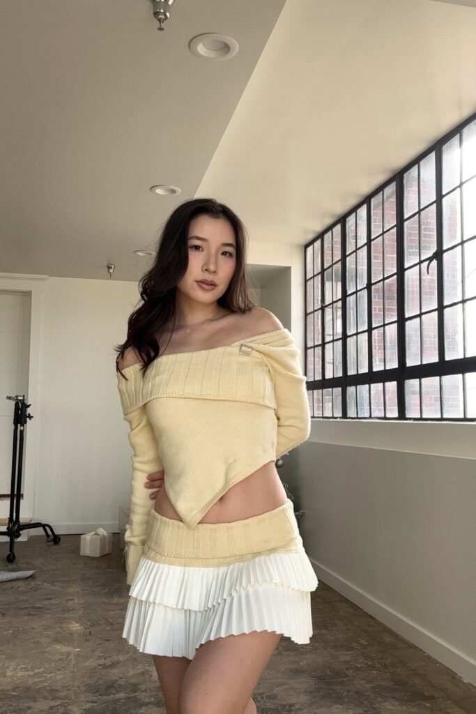 Yellow Asymmetrical Off-the-Shoulder Sweater + White Pleated Micro-Mini Skirt