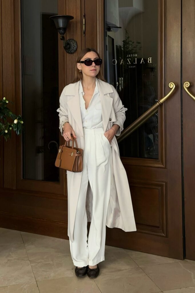 Beige Trench Coat + White Button-Down Shirt + High-Waisted White Trousers + Black Square-Toe Flats