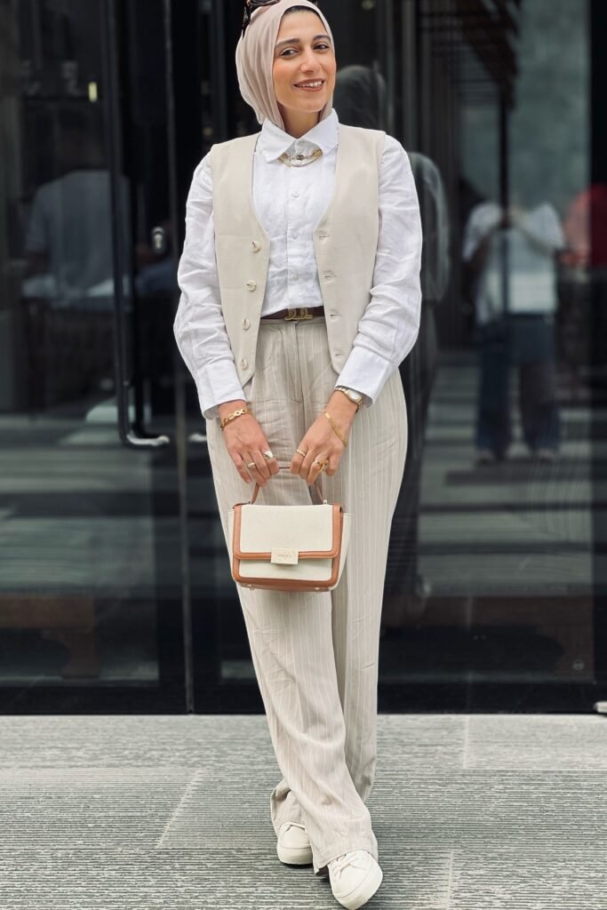 Beige Waistcoat + White Linen Shirt + Striped Beige Trousers + Tan Hijab + White Sneakers