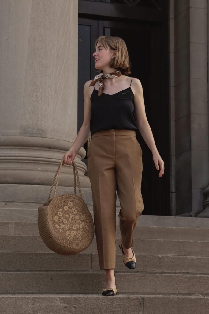 Black Camisole + Brown Tapered Trousers + Beige Cap-Toe Ballet Flats