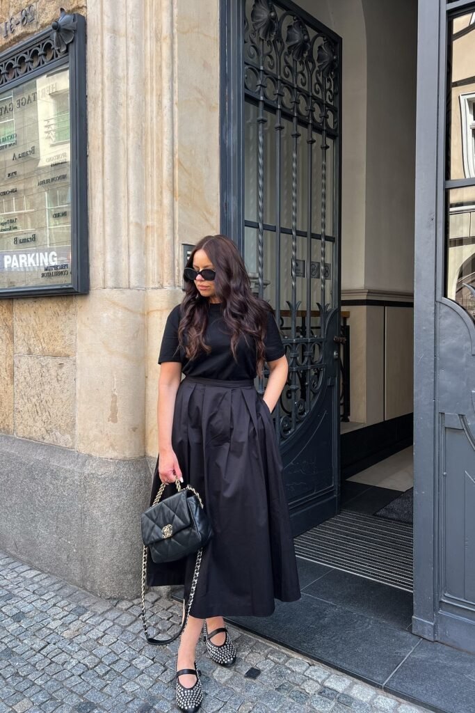 Black Crew-Neck T-Shirt + Black Pleated Midi Skirt + Embellished Black Mary Jane Flats