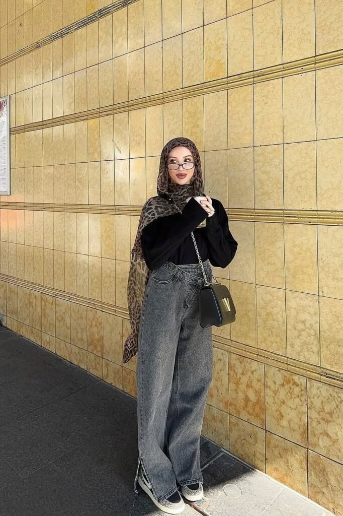 Black Crewneck Sweater + Acid Wash Grey Cross-waist Jeans + Leopard Print Hijab + Black and White High-top Sneakers