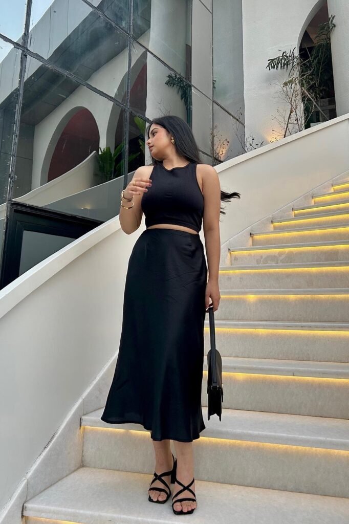 Black Crop Tank Top + Black Satin Midi Skirt + Black Strappy Heeled Sandals