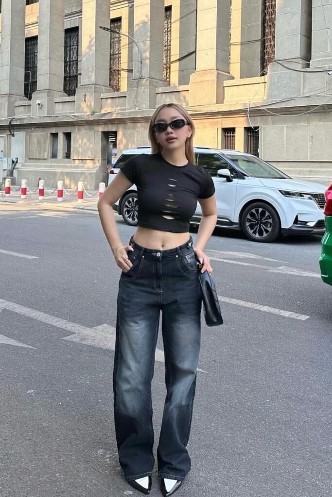 Black Distressed Crop Top + Faded Black Wide-Leg Jeans + Black and White Pointed Heels