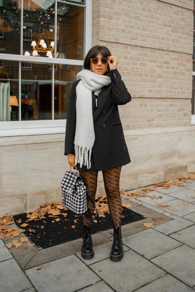 Black Double-Breasted Blazer + Patterned Tights + Black Platform Combat Boots