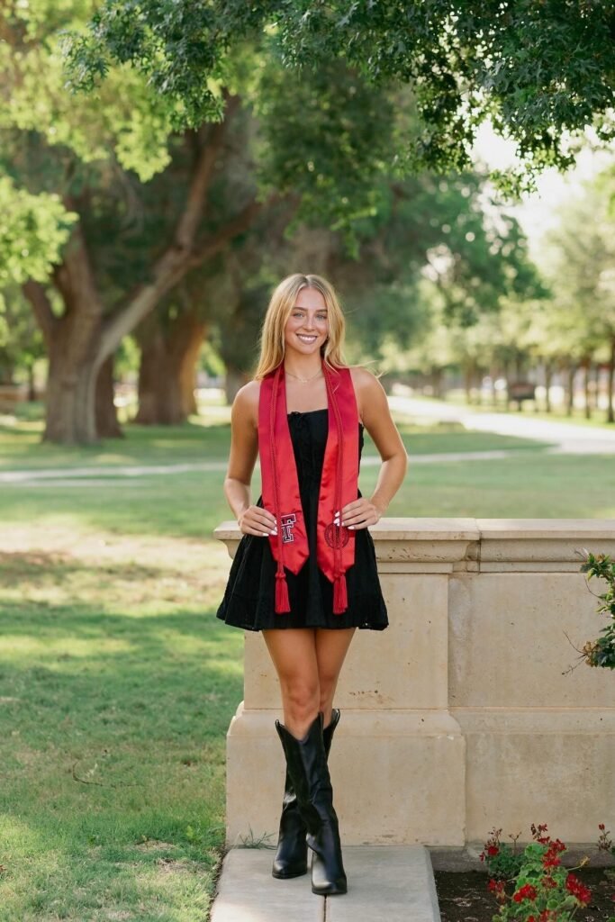 Black Eyelet Mini Dress + Red Graduation Sash + Black Western Boots