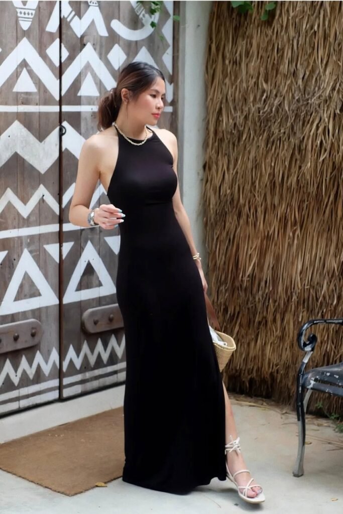 Black Halter Neck Maxi Dress + White Strappy Sandals + Straw Tote Bag