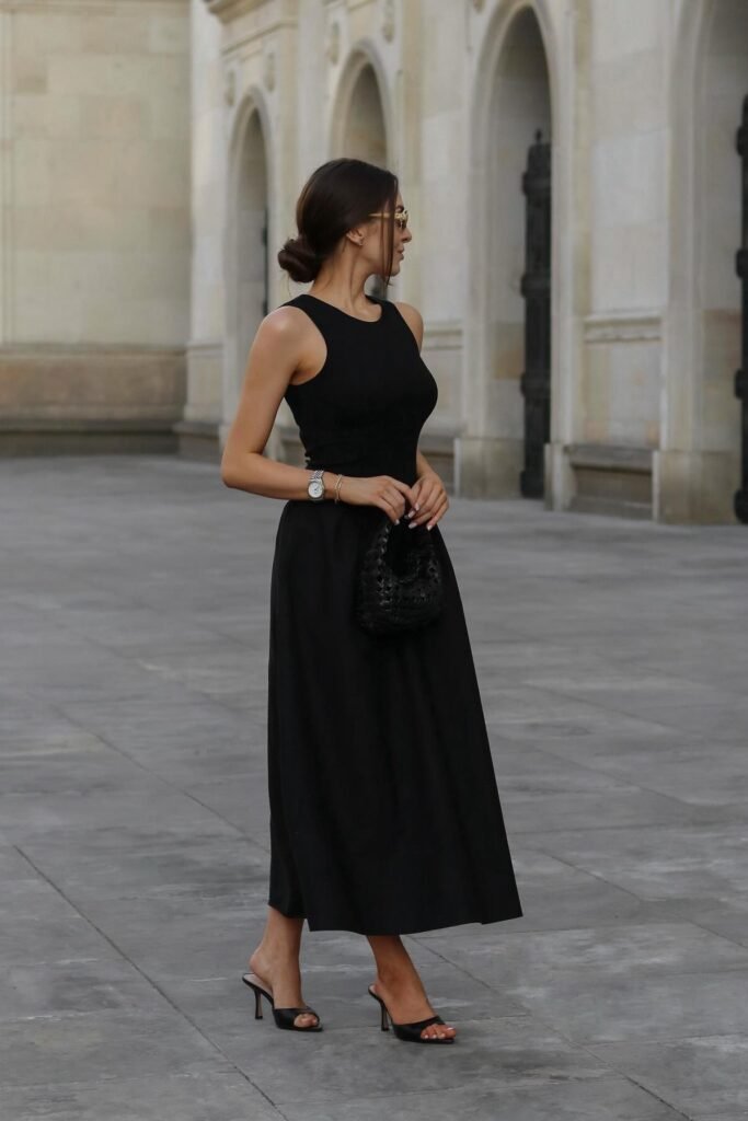 Black High-Neck Tank Dress + Small Black Woven Handbag + Black Heeled Mules