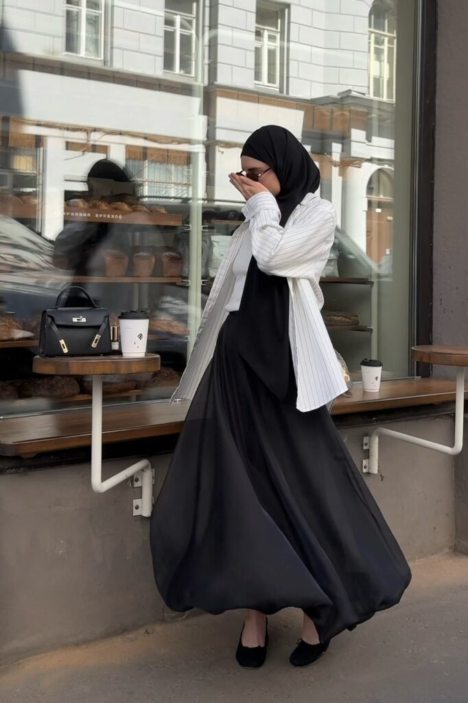 Black Hijab + White Pinstriped Shirt + White Top + Black Voluminous Maxi Skirt + Black Ballet Flats