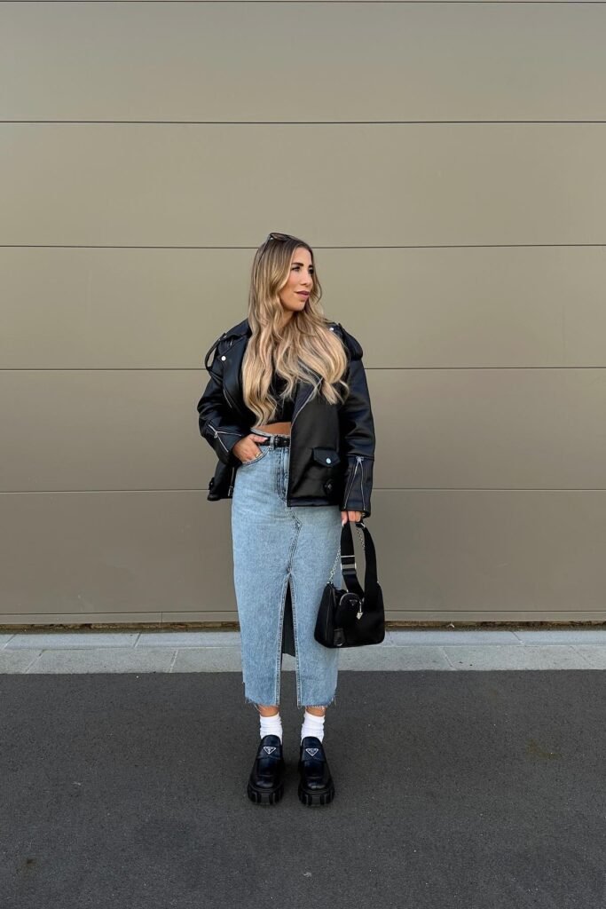 Black Leather Biker Jacket + Black Crop Top + Denim Maxi Skirt with Slit + Chunky Black Prada Loafers with White Socks