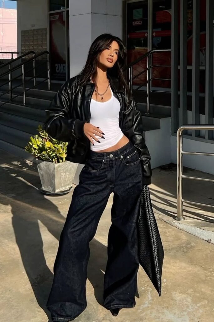 Black Leather Bomber Jacket + White Tank Top + Oversized Dark Indigo Jeans + Black Pointed Boots