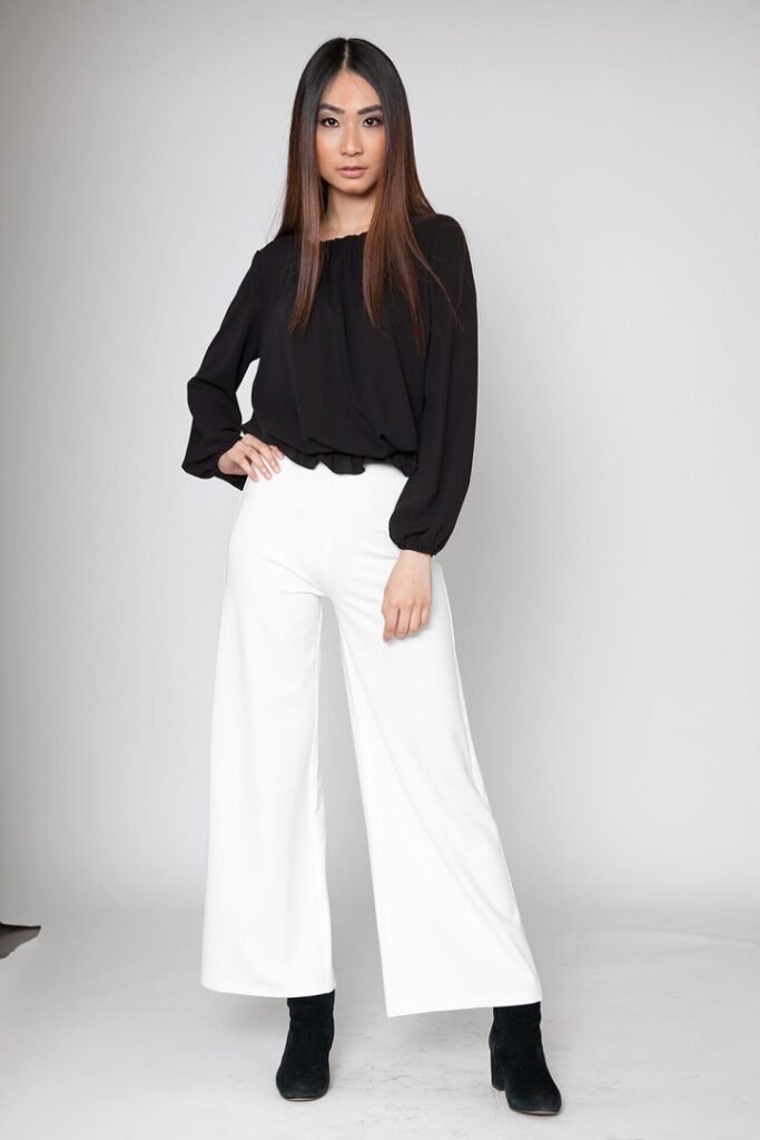 Black Long-Sleeve Blouse + White Wide-Leg Pants + Black Heeled Boots