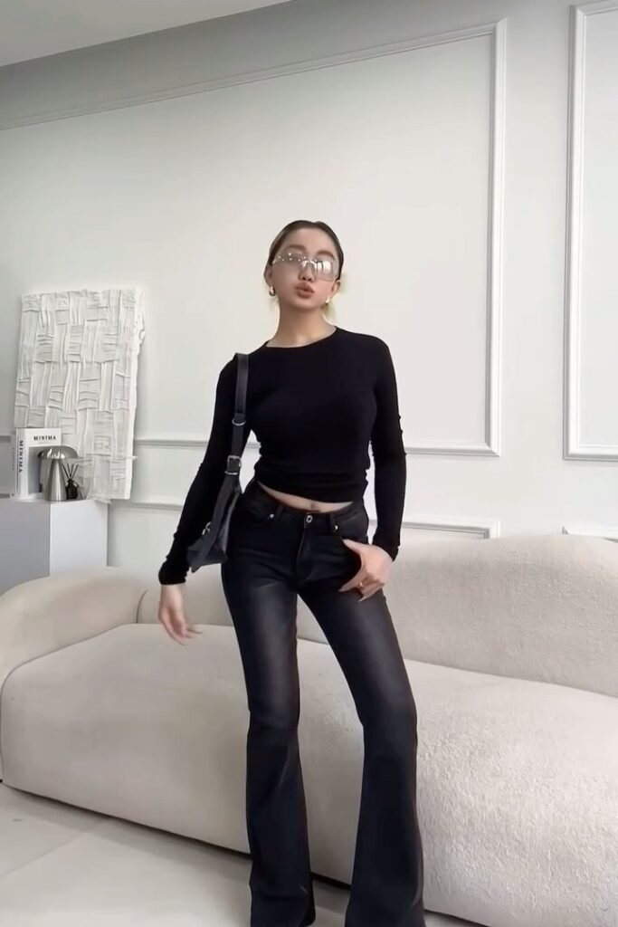 Black Long Sleeve Crew Neck Top + Black Slim-Fit Flared Jeans + Clear Oversized Glasses