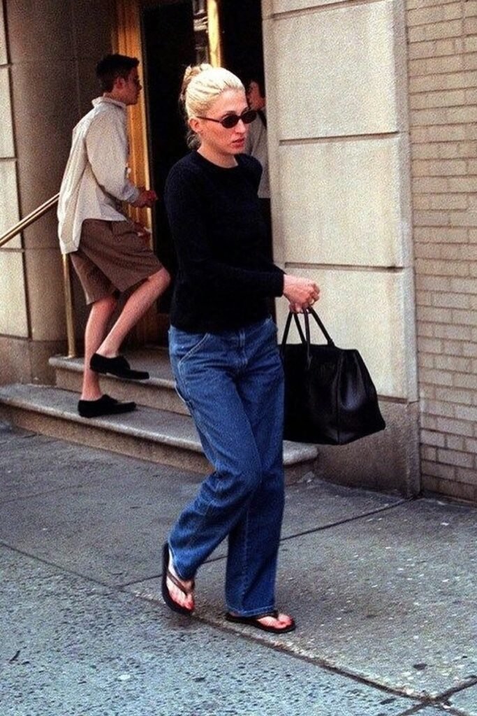 Black Long-Sleeve Top + Blue Relaxed-Fit Jeans + Black Flip-Flops