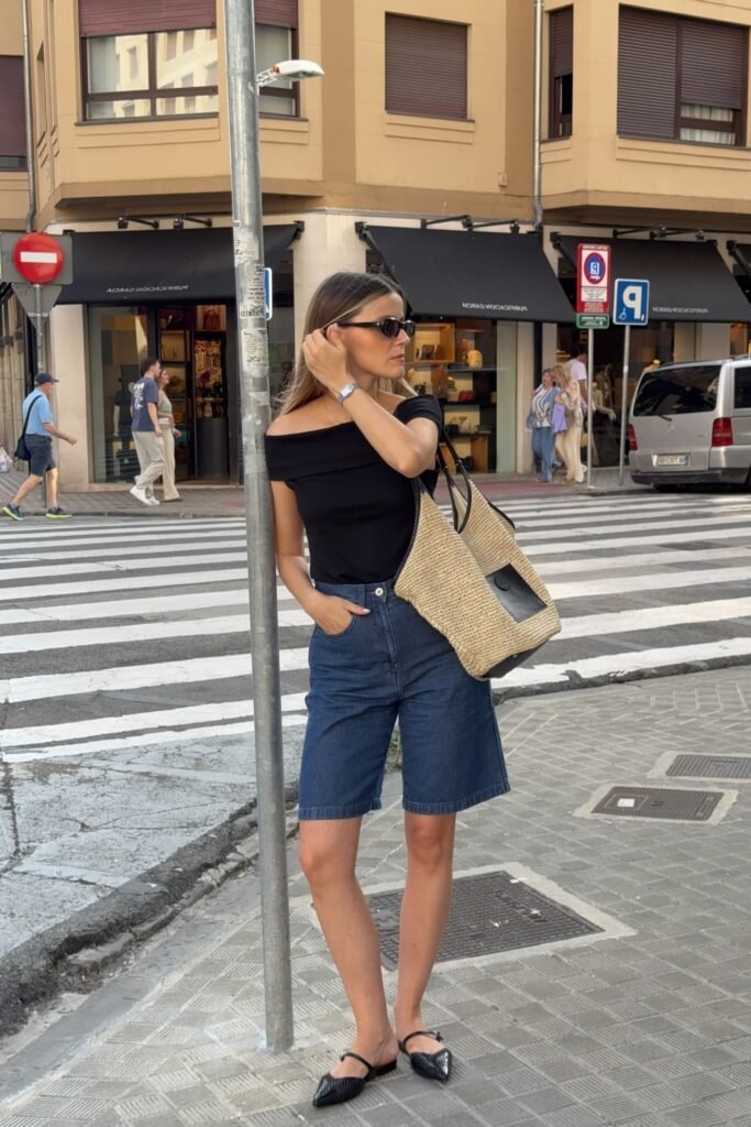 Black Off-the-Shoulder Top + Dark Wash Denim Bermuda Shorts + Black Pointed-Toe Slingback Flats