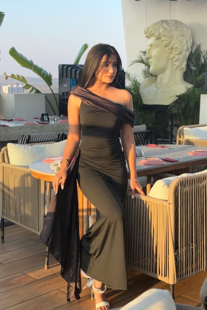 Black One-Shoulder Maxi Dress + Brown Satin Draped Detail + White Pearl-Embellished Heels