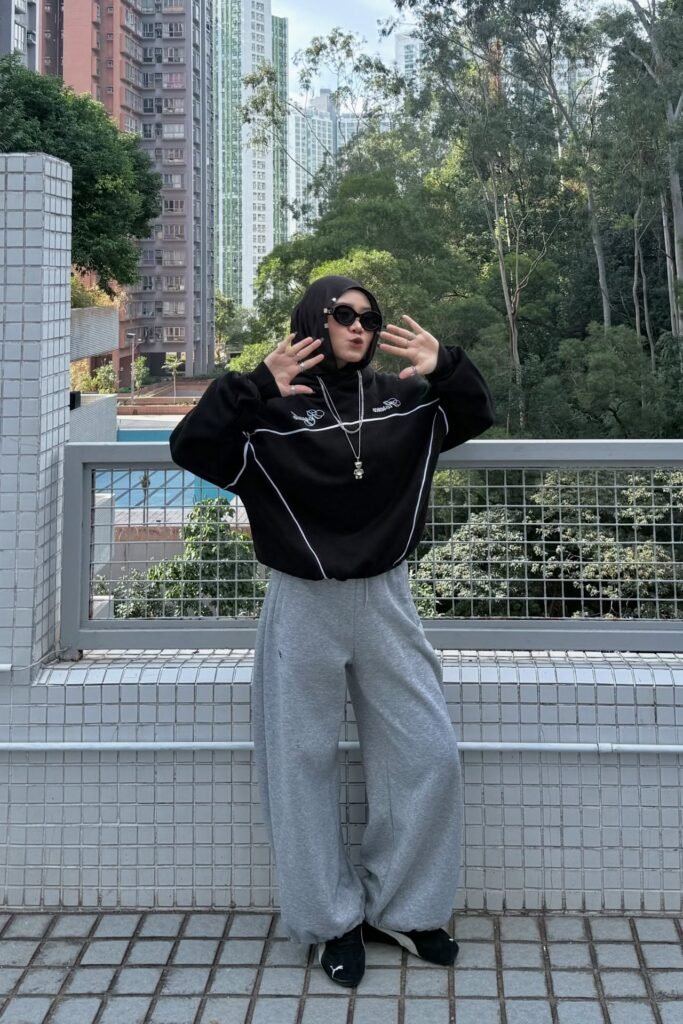 Black Oversized Graphic Hoodie + Grey Wide-Leg Sweatpants + Black Sneakers