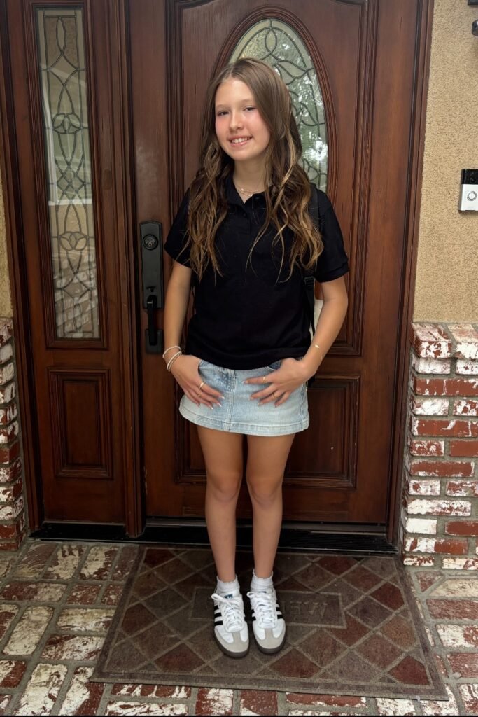 Black Polo Shirt + Light Wash Denim Mini Skirt + White Sneakers with White Socks