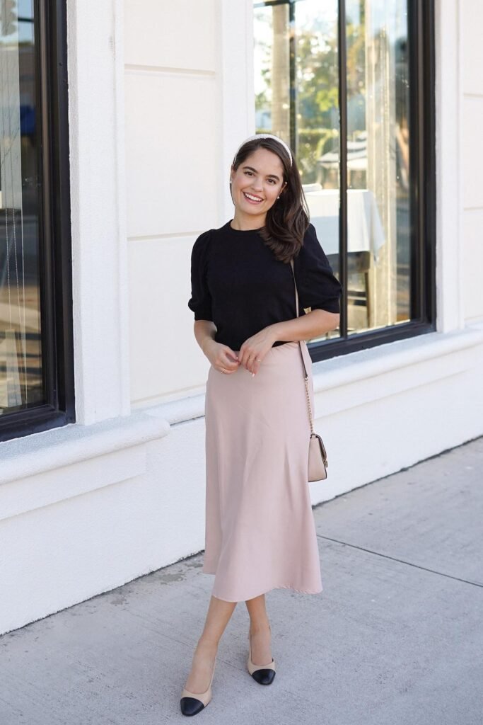 Black Puff-Sleeve Top + Dusty Pink Satin Midi Skirt + Two-Tone Cap Toe Slings