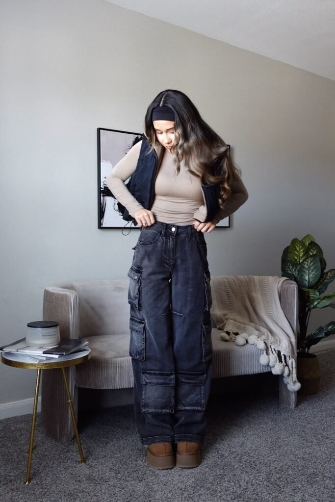 Black Puffer Vest + Beige Mock-Neck Top + Grey Multi-Pocket Cargo Pants + Platform Tan Boots
