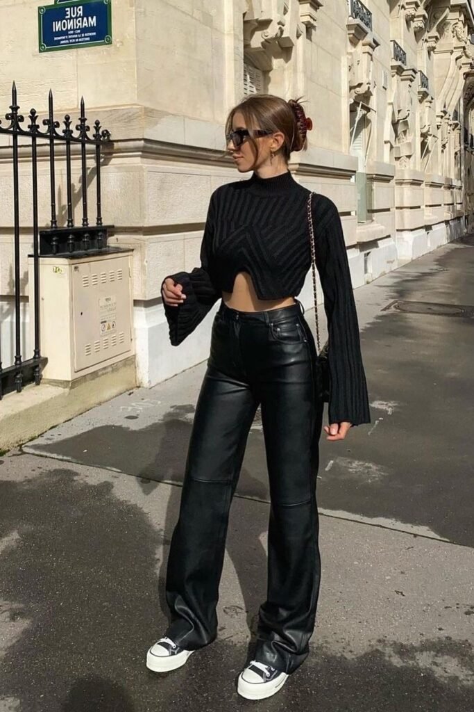 Black Ribbed Cut-Out Sweater + Black Leather Flared Trousers + Black and White Platform Sneakers