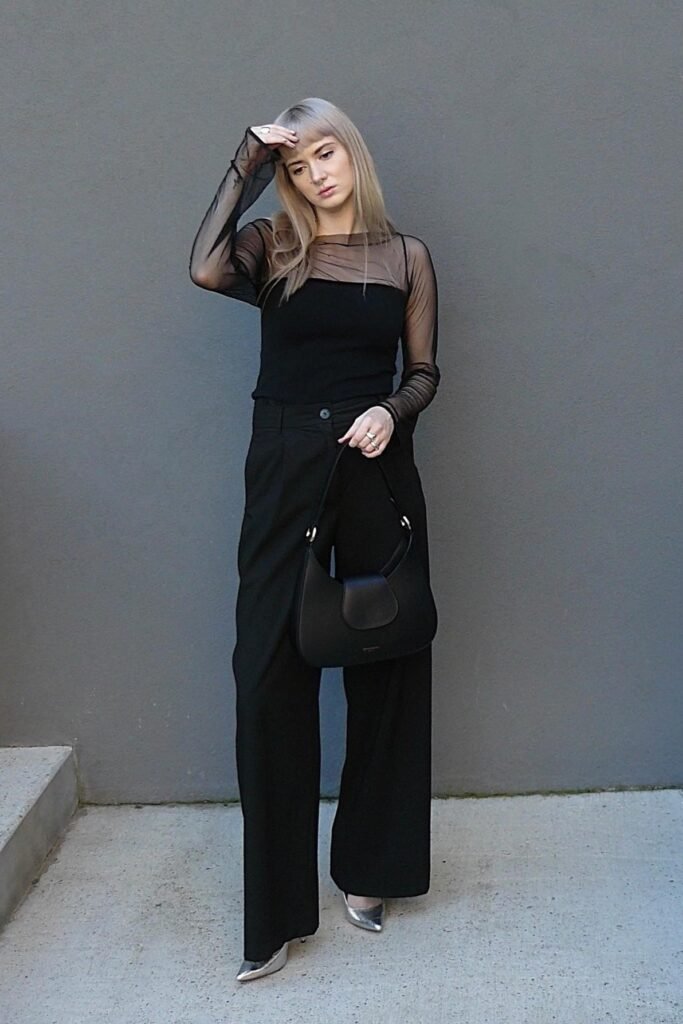 Black Sheer Long-Sleeve Top + Black Wide-Leg Trousers + Silver Pointed-Toe Heels
