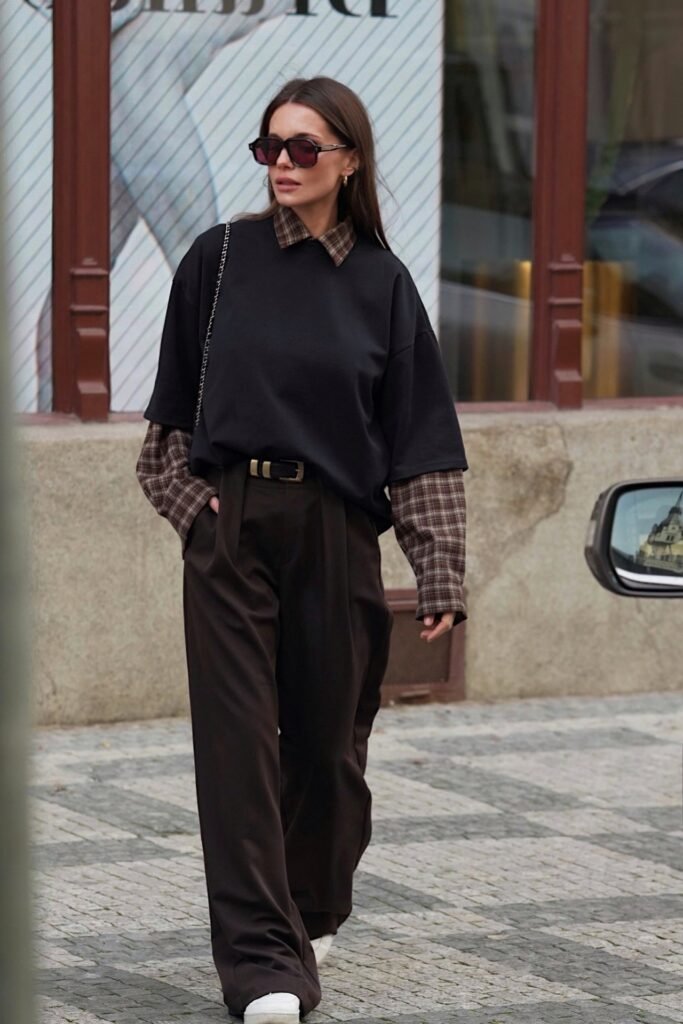 Black Short-Sleeve Oversized Tee + Brown Plaid Long-Sleeve Shirt + Dark Brown Wide-Leg Trousers + White Sneakers