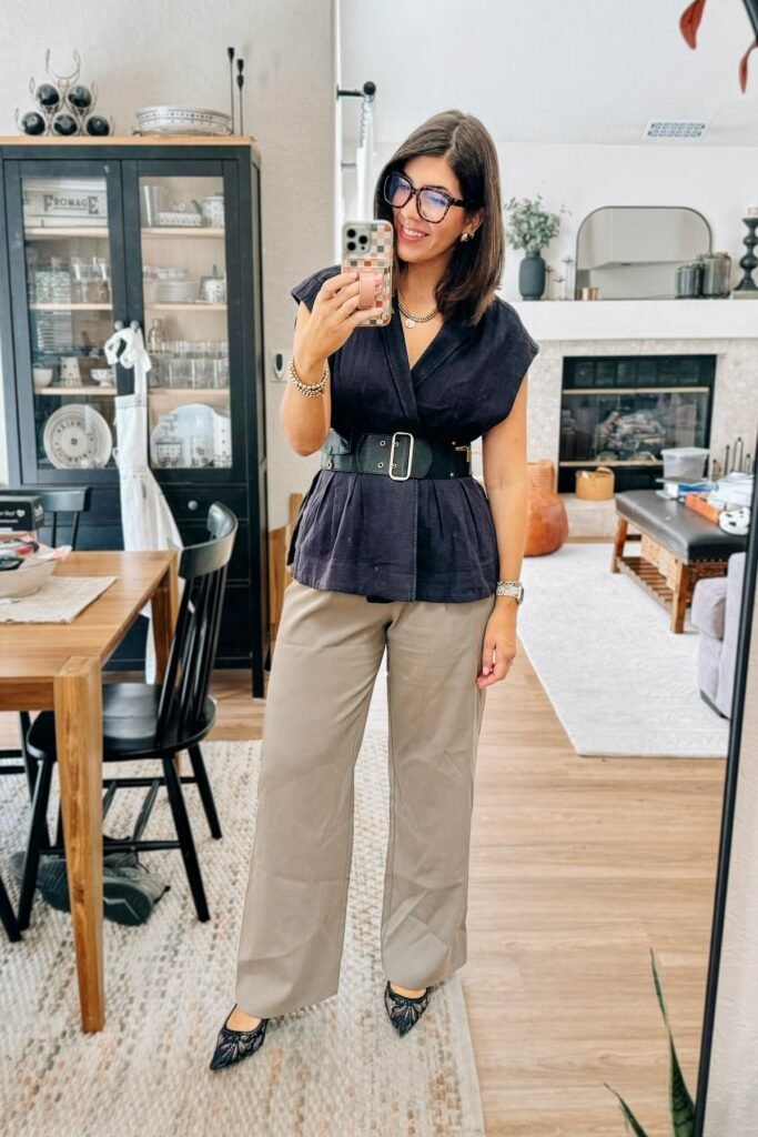 Black Short-Sleeve Wrap Top with Statement Belt + Tan Wide-Leg Trousers + Black Lace Pointed-Toe Flats