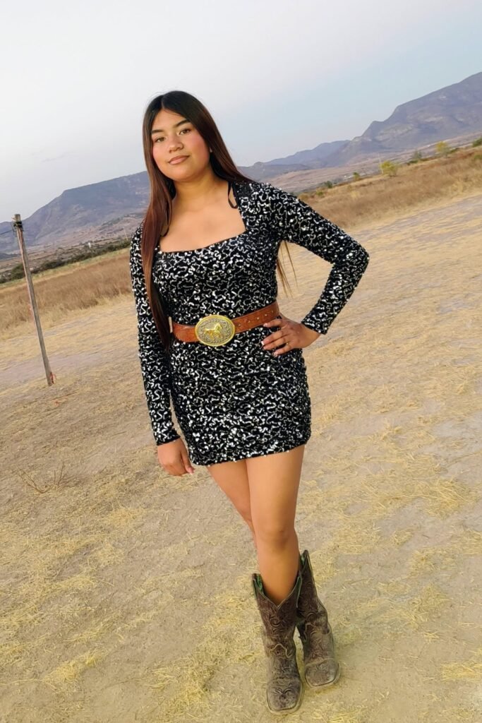Black & Silver Sequin Long-Sleeve Mini Dress + Tan Horse Buckle Belt + Distressed Brown Cowboy Boots