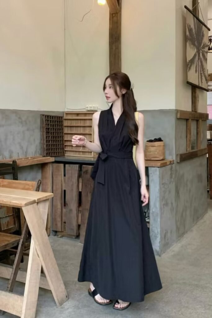 Black Sleeveless V-Neck Maxi Dress + Black Slide Sandals + Yellow Shoulder Bag