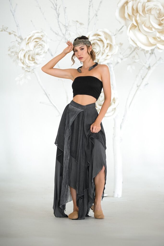 Black Smocked Tube Top + Charcoal Grey Asymmetrical Layered Maxi Skirt + Beige Woven Mules