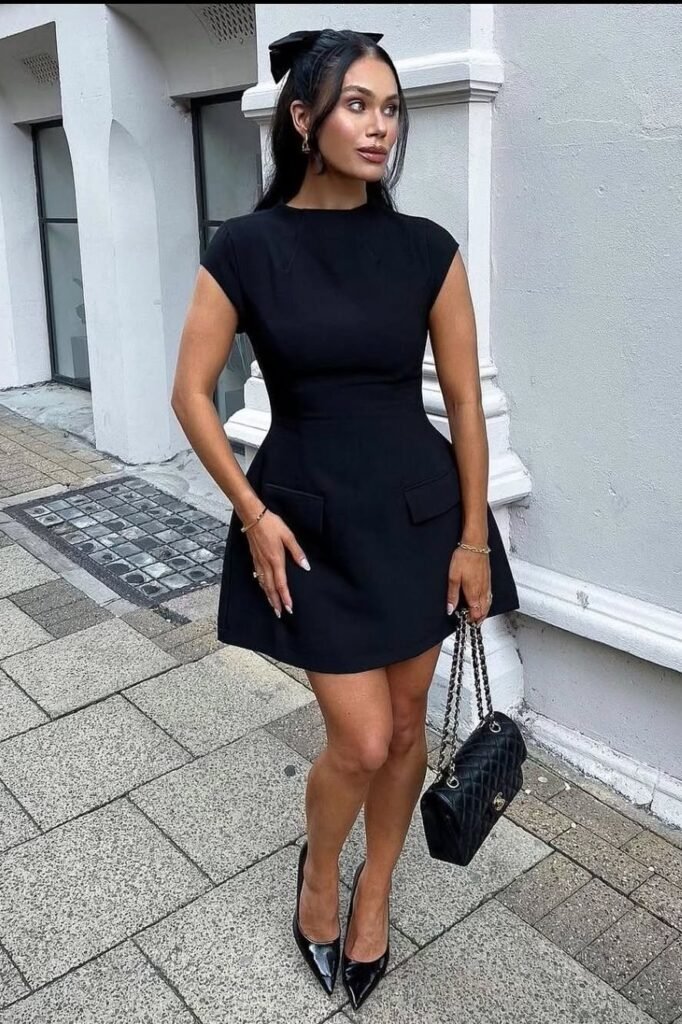 Black Structured Mini Dress with Pocket Details + Black Pointed-Toe Pumps + Quilted Black Chain Bag