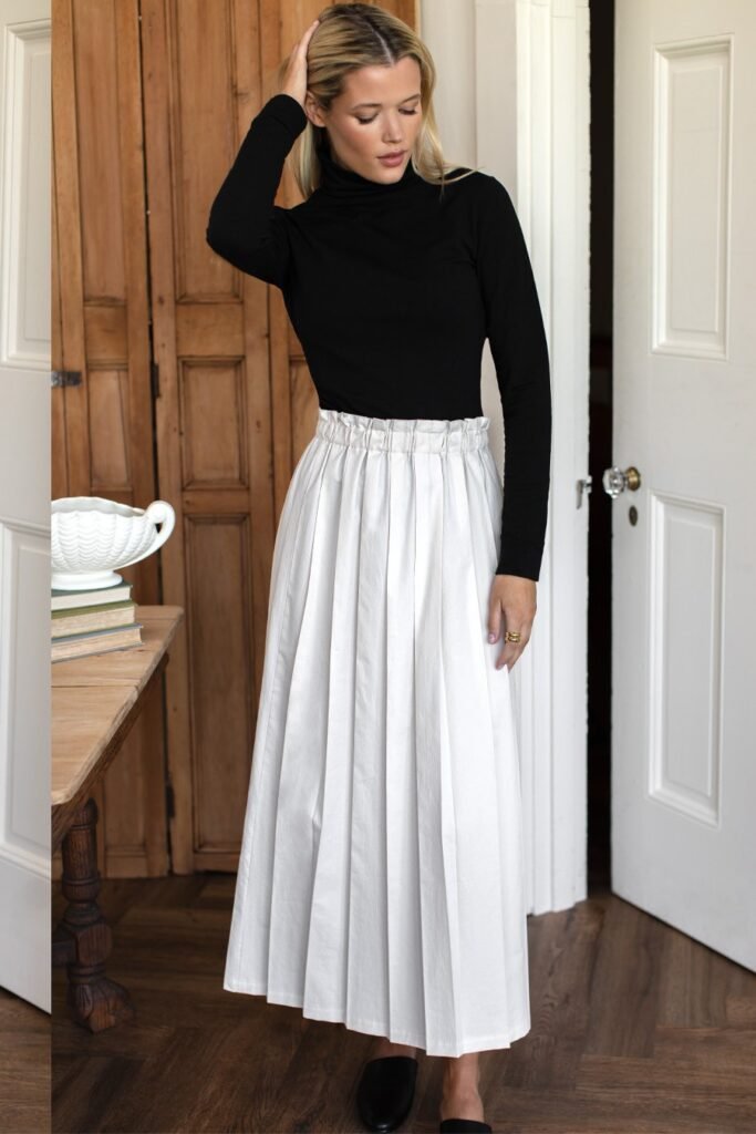 Black Turtleneck Top + White Pleated Maxi Skirt + Black Pointed Mules
