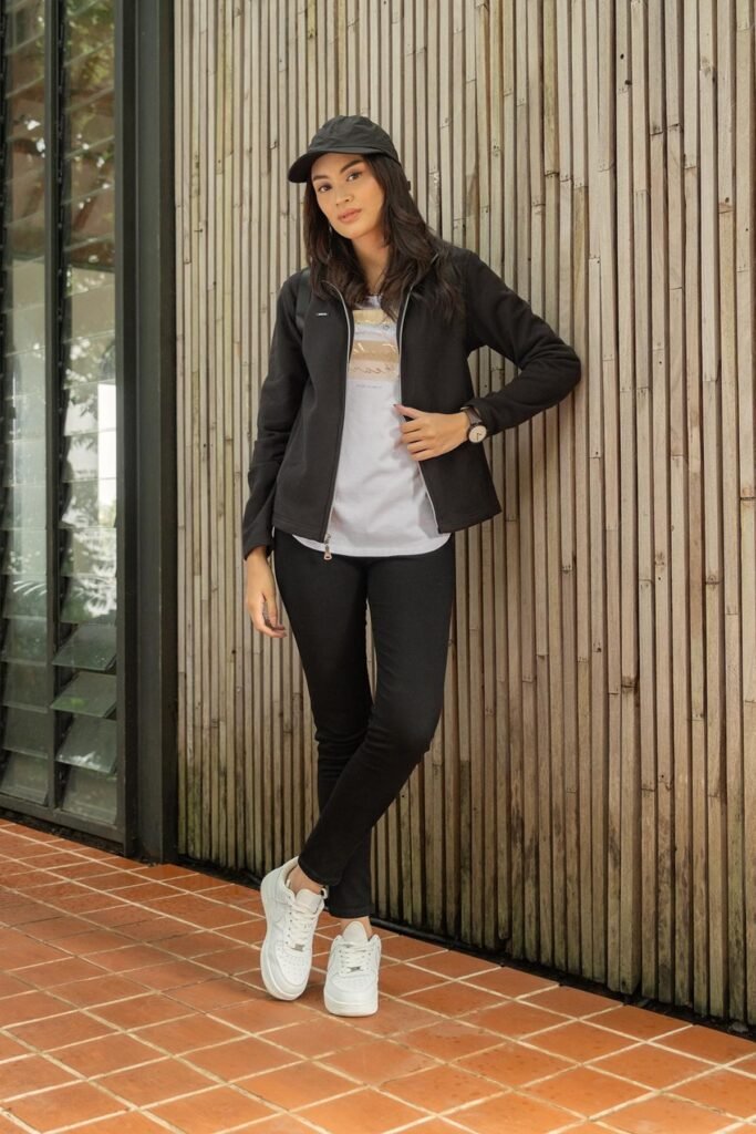 Black Zip-Up Jacket + White Graphic Tee + Black Skinny Jeans + White Sneakers