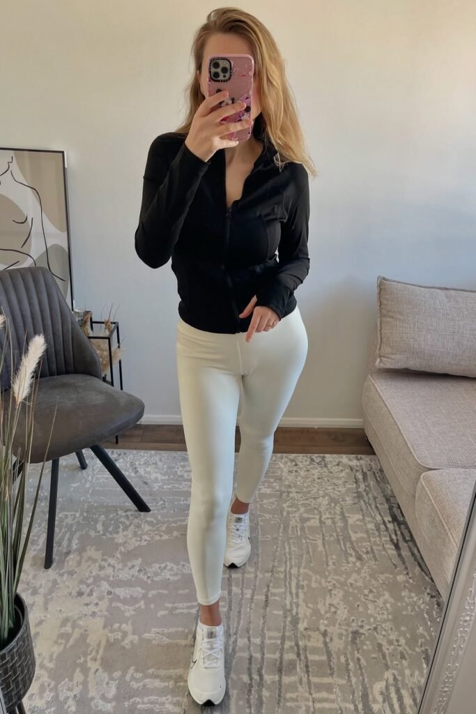 Black Zip-Up Performance Jacket + White Leggings + White Running Shoes