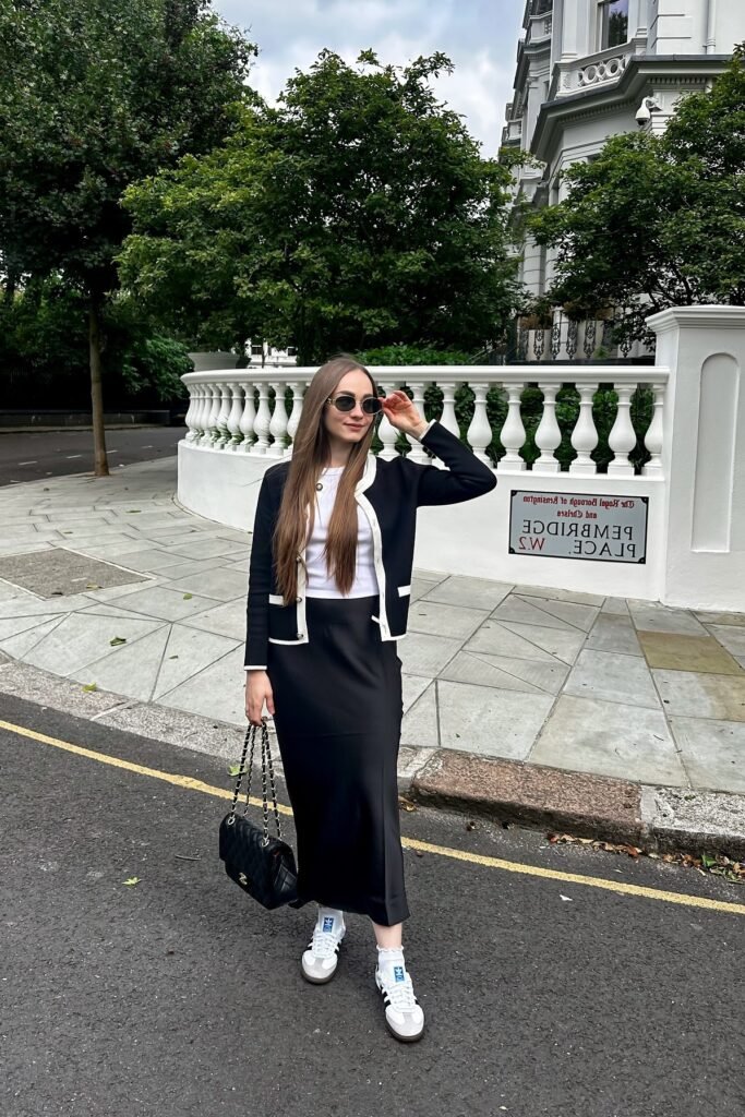 Black and White Contrast Cardigan + Black Satin Midi Skirt + White Sneakers