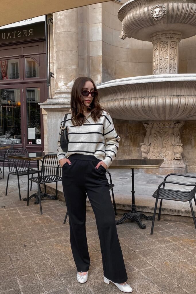 Black and White Striped Quarter-Zip Sweater + Black High-Waisted Wide-Leg Trousers + White Square-Toe Ballet Flats