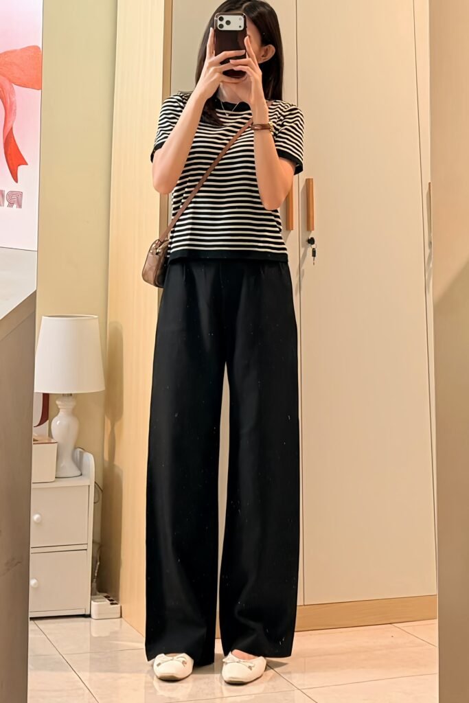 Black and White Striped T-Shirt + Black Wide-Leg Trousers + White Ballet Flats