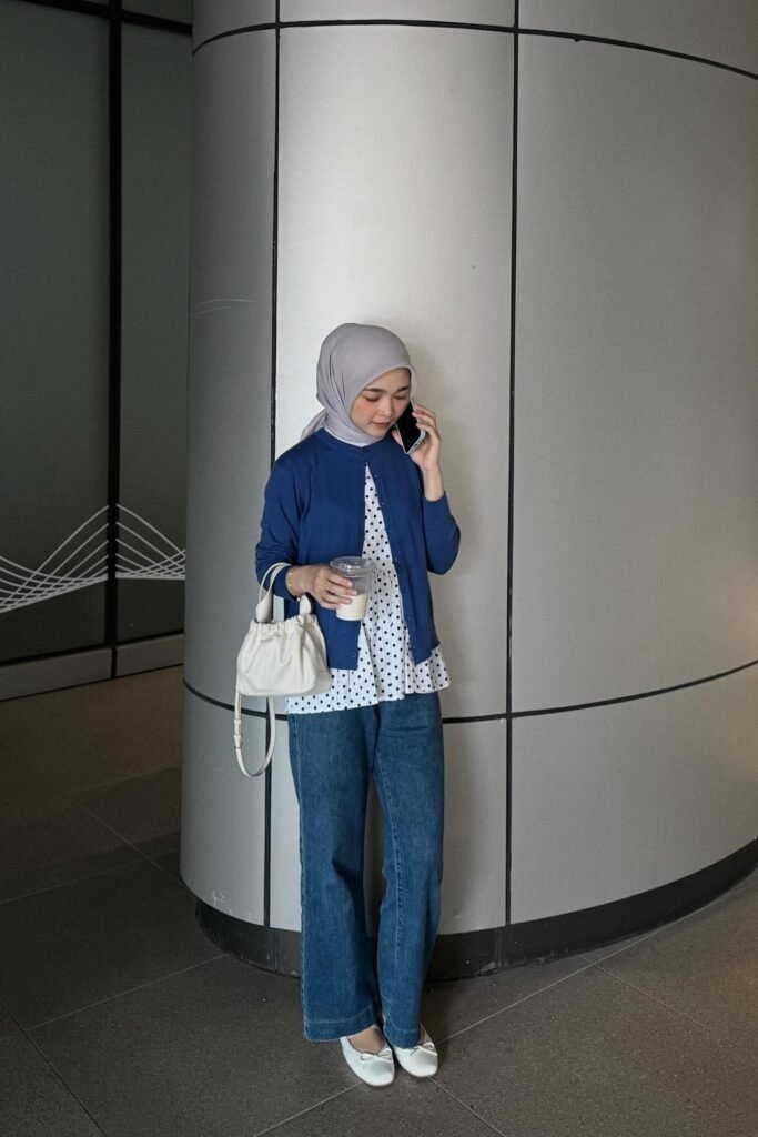 Blue Cardigan + Polka Dot Blouse + Medium Wash Straight Jeans + Grey Hijab + White Ballet Flats