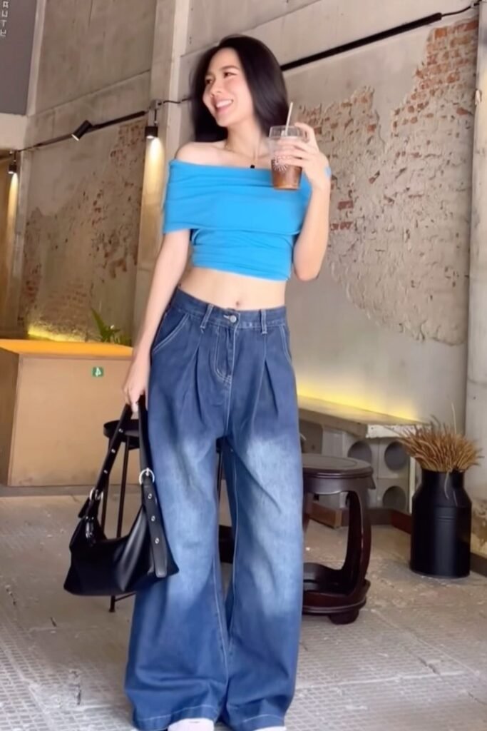 Blue Off-the-Shoulder Crop Top + Baggy Light Wash Pleated Jeans + White Sneakers