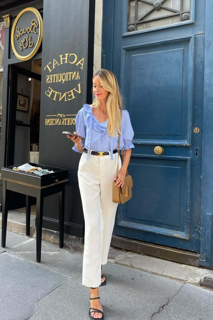 Blue Ruffled Button-Down Shirt + White High-Waisted Trousers + Black Strappy Sandals