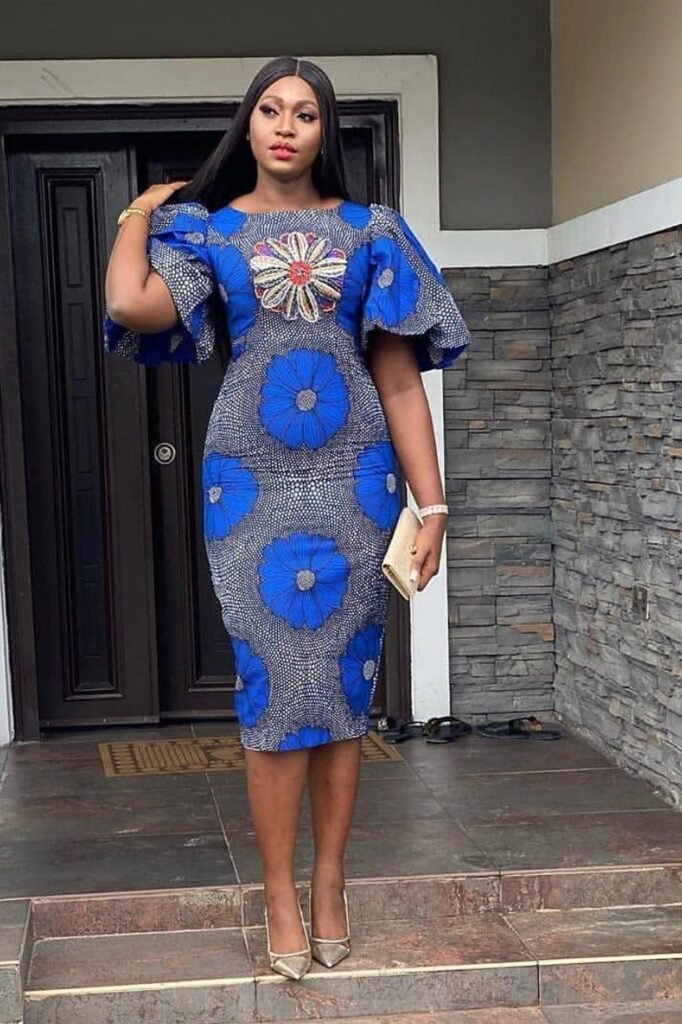 Blue Sunburst Print Pencil Dress with Dramatic Puff Sleeves + Gold Pointed-Toe Heels
