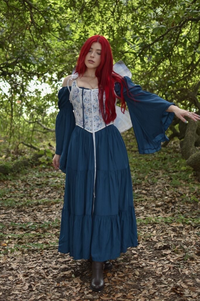 Blue Tiered Maxi Dress + White Floral Corset + Bell Sleeves + Brown Boots