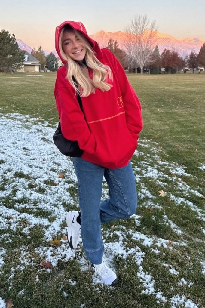 Bright Red Hooded Sweatshirt + Medium Wash Straight-leg Jeans + White Athletic Sneakers