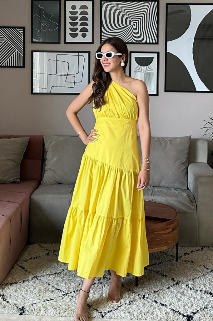 Bright Yellow One-Shoulder Tiered Dress + White Sunglasses + Clear Heels