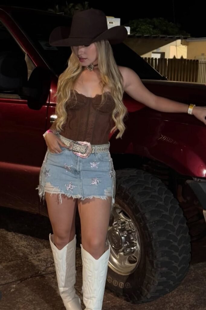 Brown Corset Top + Star-Embellished Denim Mini Skirt + White Cowboy Boots + Brown Cowboy Hat