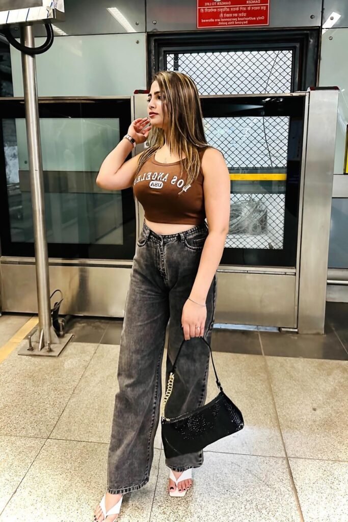 Brown Graphic Tank Top + Grey Acid Wash Wide-Leg Jeans + White Thong Sandals