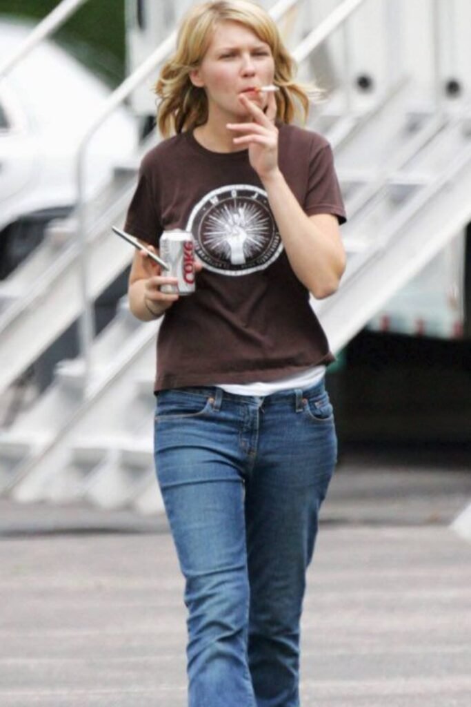 Brown Graphic Tee + Low-Rise Straight Leg Jeans + Casual Blonde Waves