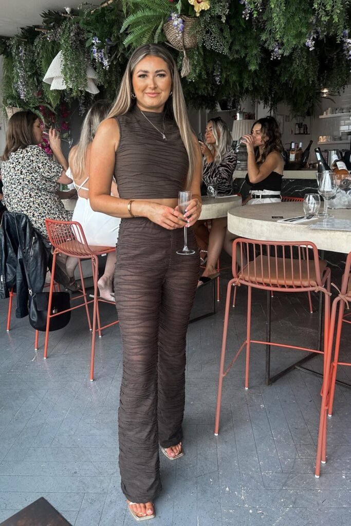 Brown Textured High-Neck Crop Top + Brown Textured Flared Trousers + Gold Strappy Sandals